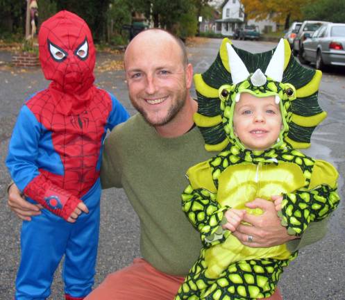 Halloween makes a comeback Ray Piskadlo with his sons, from left, "Spiderman" Harrison, 4, and "Dinosauer" Jacob, 2. Additional photos can be found online at warwickadvertiser.com.