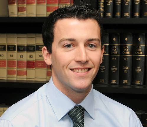 Accounting firm hires two local men Brian Roerden