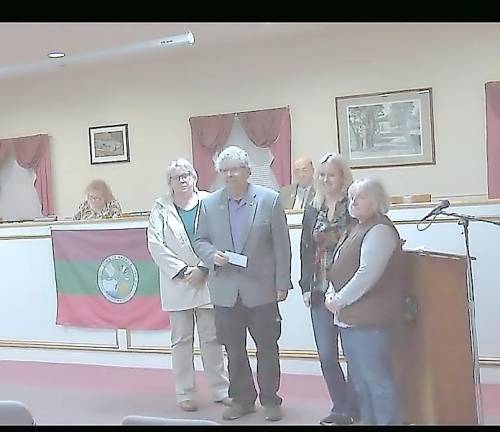 Correction for photo Left to right, back row: Nancy Scheinert, Susan McCosker, and Paulette Wilk Rudy are members of the Pine Island Recreation Committee. Russell Kowal, front, is a Warwick Town Council member.