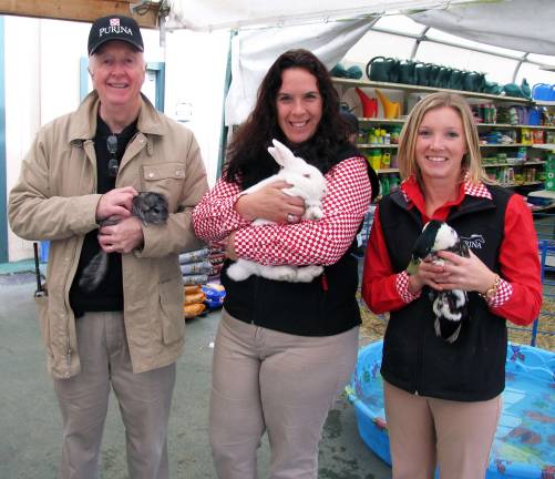 Wadeson becomes Purina Feed dealership Photo by Roger Gavan From left, Bill Wadeson poses with Purina sales specialists Christine Siracusa and Jaime Brockett.