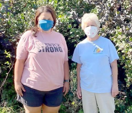 Backpack Snack Attack’s incoming executive director, Jenna Price (left), with retiring Executive Director and Co-Founder Shirley Puett. Photo provided by Louise Hutchison.