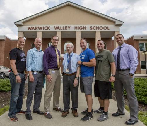 School to display donated memento of 1955 World Series Pictured from left to right are teachers Rocco Manno, Peter Scheuermann and Jeff Jacobsen; substitute teacher Yale Ekus; Athletic Director Gregory Sirico; and teachers Erik Rosa and John Garcia.