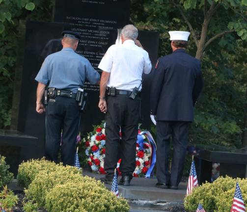 During the ceremony representatives of the Police Department, Fire Department and Ambulance Corps laid wreaths at the Warwick Citizens World Trade Center Memorial.