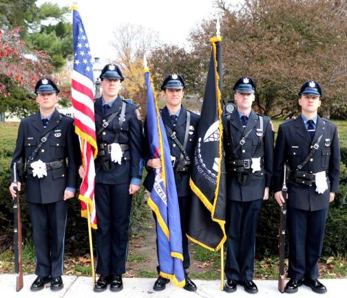 Warwick. Warwick Police Department brings back its Color Guard Unit Members of the new Town of Warwick Police Department Color Guard participated in the recent Veterans Day Parade and ceremonies. Pictured from left to right are: Officer Sean McNamara, Officer Neil Ryan, Sgt. Brian Luthin, Officer Brian Siniscalchi and Officer Michael Mazzella. Other members of the Color Guard who could not be present for the photograph that day are Sgt. Keith Slesinski, Officer Brien Pennella, Officer Joseph Kennedy and Officer Russell Sircable. Photo by Roger Gavan.