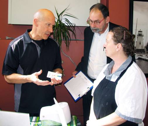 Hospital employees learn small changes can make a big difference Richard Mayer, left, and Harold Olmstead of Pharmanex explain the benefits of antioxidants to Mount Alverno chef Pat Jacobucci.
