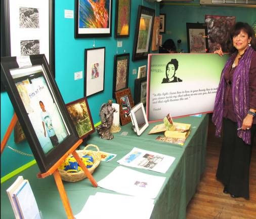 Third annual Tista Creative Arts Exhibit held at Tuscan Café Photos by Roger Gavan On Friday evening, April 27, the Tuscan CafÈ on South Street in the Village of Warwick hosted the third annual Tista Creative Arts Exhibit. Pictured here is Judy Battista by the artist display.