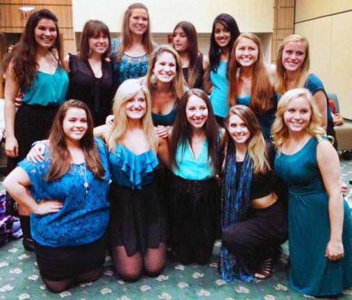 The sounds of women singing Ithaca CollegeþÄôs all female a cappella group, Premium Blend, lines up for the camera in anticipation of its Nov. 24 appearance at The Dautaj Restaurant in Warwick. In conjunction with their þÄú2013 Turkey Tour,þÄù a five-day performance and teaching excursion, the group will also deliver a workshop to Warwick Valley High School students on Nov. 25. Allison Dethmers, a graduate Warwick Valley High School, is the second person on the left in the first row.