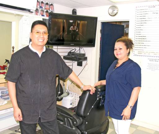 Greenwood Lake Barber Shop celebrates anniversary with a bargain Photo by Roger Gavan This coming Wednesday, June 11, Irderson Suarez and his wife, Lidia, will celebrate the second year anniversary of Greenwood Lake Barber Shop.