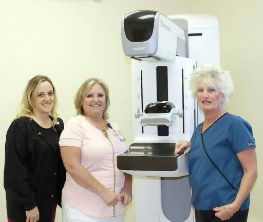 St. Anthony Community Hospital introduces 3D mammography From left: Amanda Collado, RT(R)(M), Women’s Imaging Supervisor; Janet McComb, MPA, Regional Director, Imaging Services; and Lori Lade, RT(R)(M), Mammography Technologist.