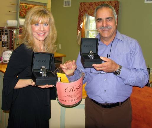 Pink Friday fund-raising success Photo by Roger Gavan Forever Jewelers is selling chances to win his and hers matching stainless steel Movado Museum watches worth $1,400.00. Tickets are $10 each and may be purchased at the jewelry store, 36 Main St. The drawing will be held Oct. 31 at 4 p.m. The winner need not be present. From left, store manager Catherine Demercado and owner Moshe Schwartzberg.
