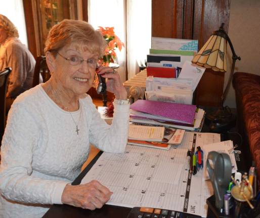 Warwick's Friendly Visitor Program: 'You get more than you give' Photos by Elise GoldScheduling a ride for a Town of Warwick Friendly Visitor Program volunteer to take her husband to a medical appointment is carefully recorded on a calendar by Lucy Fischetti during her phone contact with the volunteer.