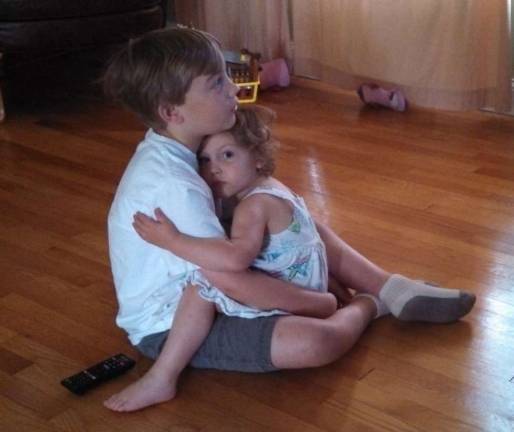 Love is in the air Leigh Jonaitis of Greenwood Lake, N.Y. "Sibling hug. Anya (3) holds on tight to her big brother Jonah (8)."