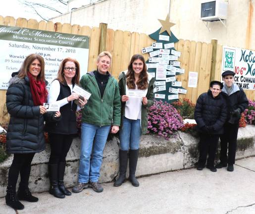 Annual Angel Tree now in place for 2018 Photo by Roger Gavan From left, Angel Tree committee members Kim Corkum, Cindy Vanderplaat, Betsy Mitchell, Olivia Quinones and Susan and Glenn Dickes.
