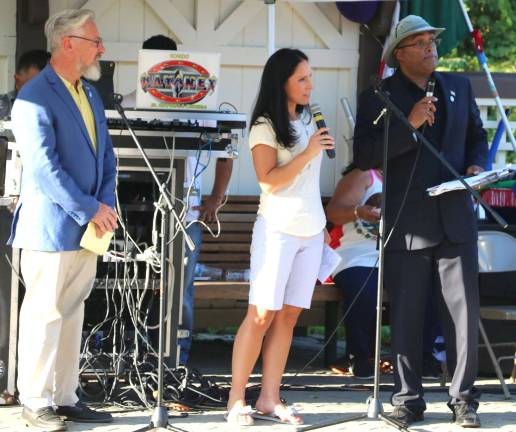 Bienvenidos A simultaneous translator was on hand as Rev.Rolfi Elivo (right) introduced Warwick Mayor Michael Newhard who praised the group for adding to the diversity and culture of the community.