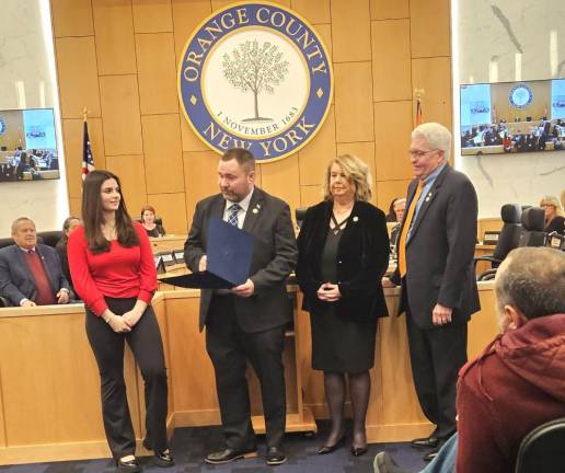 Julia Roome with Legislators Paul Ruszkiewicz, Katherine Bonelli, and Barry Cheney at the January 4 Orange County Legislature meeting.