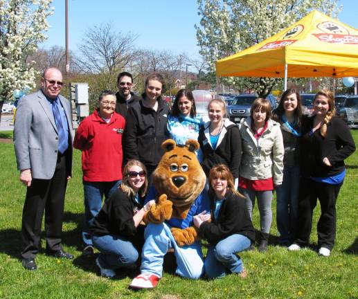 Warwick ShopRite raises funds for autism awareness Photo By Roger Gavan Warwick ShopRite Store Director Bob Courtenay (left) poses with employees and shopper advocates Michelle Laurice and Cortney Wright (center with mascot), at an all day ìtailgateî barbecue to raise funds for Autism Speaks, the worldís leading autism science and advocacy organization.