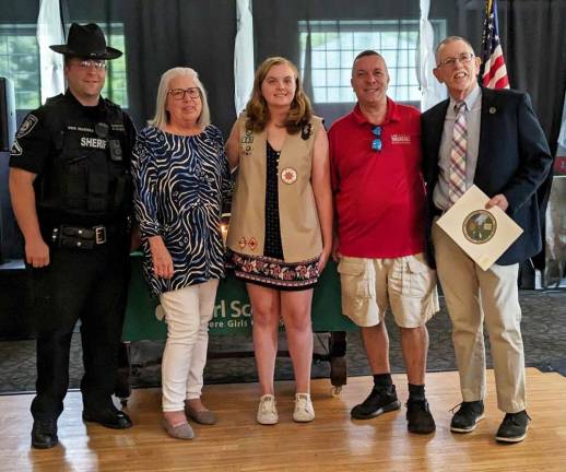 Stefanie Sommer awarded Gold Award Pictured from left to right are: Deputy Sheriff Justin Worden, Village Trustee Nancy Clifford, Stefanie Sommer, Assemblyman Karl Brabanec, and Warwick Town Supervisor Mike Sweeton. Photo by Cathy Sommer