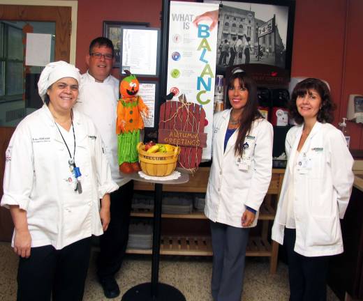 ‘Healthy Holiday Apps’ St. Anthony Community Hospital will host a free informational event, ìHealthy Holiday Apps,î at 5:30 p.m., Tuesday, Oct. 16, in the Greenbriar Room at Mount Alverno Center. From left, Morrison Healthcare Assistant Director Carmela Decker; Director Michael Cooper; Lead Dietitian Janine Killeen; and registered nurse Gigi Fried.