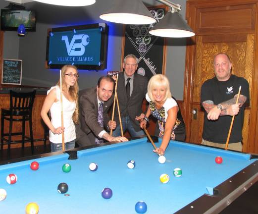Chamber to host mixer at Village Billiards Photo by Roger Gavan Members of the upcoming mixer committee and Village Billiards staff warm up for next Thursday's get together. From left, Village Billiards Manager Sarah Colley, Warwick Valley Chamber of Commerce past President Paul Rafanello, Executive Director Michael Johndrow, Committee Chair Janine Dethmers and Village Billiards owner Adam Powers.