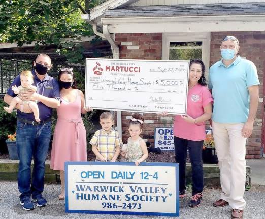 Warwick. Humane Society receives $5,000 matching grant From left, Mike Martucci, Erin Martucci, their children, and Suzyn Baron, president of the Warwick Valley Humane Society, and Stephan Kitar. Provided photo.