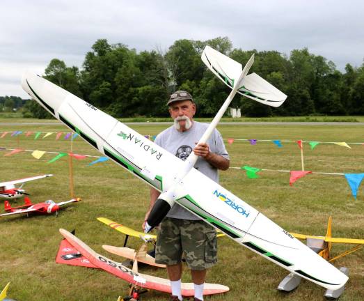 Warwick airport hosts seventh annual 'Electric Fun Fly' Pat Moschiano prepares to launch his Radiant XL glider.