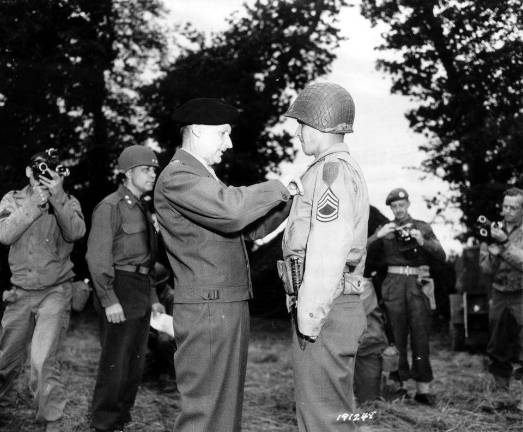 Son revives amazing lost story of Philip Streczyk, D-Day hero Gen. Montgomery pins the British Military Medal on Tech Sgt. Philip Streczyk