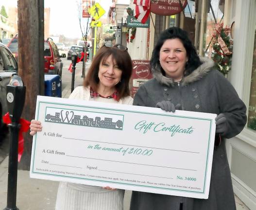 From left, Home for the Holidays co-chair Mary Beth Schlichting, owner of Frazzleberries, and co-chair Corrine Iurato, manager of Peck’s Wines &amp; Spirits.