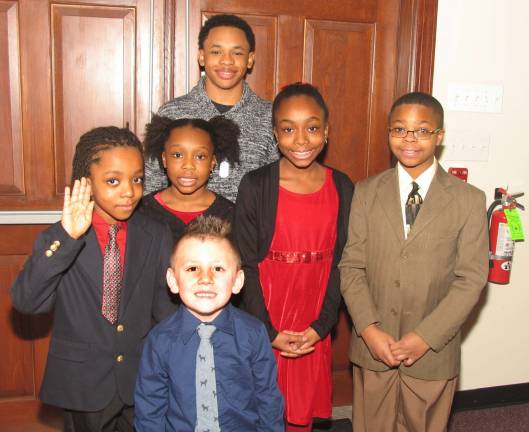 Warwick's Union AME Church celebrates Martin Luther King Jr. Members of the UME Youth Ambassadors each presented individual tributes to Dr. King. Front: Keegan Meli Center from left, Jay Seward, 7, his sister Randie, 7 and sister Lexie,8 and Bryce Walker, 10. Rear: Gabriel Ames, 16.