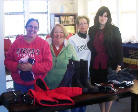 Chabad aids Sandy relief efforts Photos courtesy of Chabad of Orange County Organizers and volunteers of Chabadís Sandy Relief Effort, from left to right: Bracha Pincus of Chester, Stacey Finkelstein of Middletown, Loren Chwan of Warwick and Sima Zelenko of Monroe.