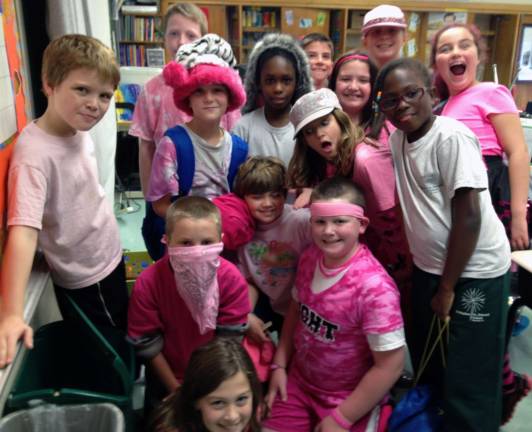 St. Stephen’s School goes pink for Miles of Hope On Friday, Oct. 11, the students and staff of St. Stephen-St. Edward School in Warwick dressed in pink to support breast cancer awareness. They raised $900.