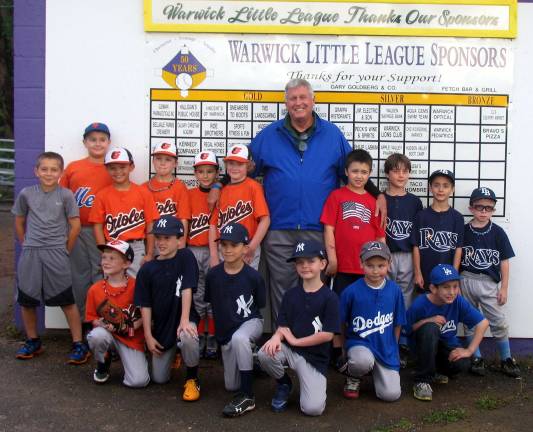 ‘Throw strikes’ Photo by Roger Gavan Tommy John (center) poses for photographs with the ìInstructional 8î All Stars prior to their game last Friday at Veterans Memorial Park in Warwick.