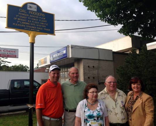 Historic marker commemorates first transcontinental flight in 1911 Assemblywoman Annie Rabbitt recently joined residents and local officials at the unveiling of a historic marker on Dolson Avenue in Middletown to commemorate the 102nd anniversary of the Vin Fiz Flyer, the first successful transcontinental flight across the United States. The plane departed from Sheepshead Bay on Sept. 17, 1911; later that day a crowd of 9,000 greeted pilot Cal Rogers at the former Pleasure Grounds Race Track in Middletown. Pictured from right to left are: Assemblywoman Rabbitt, event organizers and Warwick residents Linda and Ed Dubin, Warwick Town Justice Peter Barlett and David Hoovler, the Republican candidate for Orange County District Attorney.