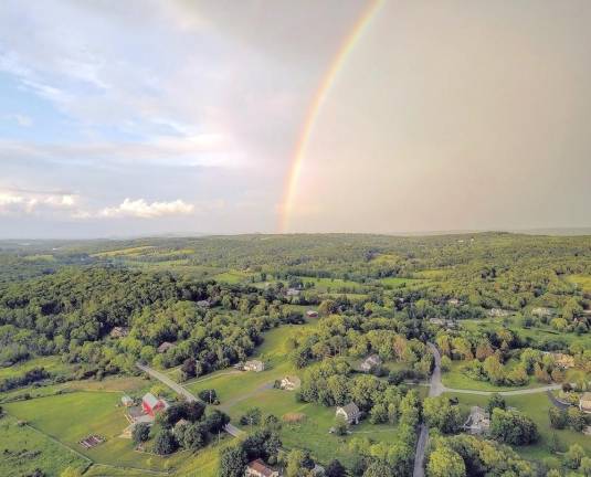 Richard McGuire shared this aerial photo of a rainbow that filled the sky above Union Corners and Sargent Road in Warwick shortly after 8 p.m. on June 9th. In an email exchange with The Warwick Advertiser, McGuire said it was approximately three to five minutes from the time he first saw the rainbow until he set up and launched the drone. McGuire added that the drone was 100 meters up in the sky when the shutter clicked to capture the image.
