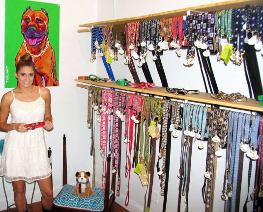Young entrepreneur opens dog boutique in Sugar Loaf Photo by Roger Gavan Kayla Scarane opened her upscale dog boutique, Scarletís Way, a Dogís World, in Sugar Loaf two months ago.