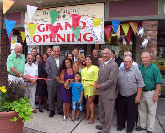 Worth Buying Home Decor celebrates grand opening Photo by Roger Gavan On July 10, local elected officials and Board members of the Village of Florida Chambers of Commerce joined owner Andrea Muster and her family to celebrate the grand opening of Worth Buying Home DÈcor. Andrea Muster (center) pictured with her husband, John, son Michael, 9, and daughter Krysta, cuts the ribbon held by Florida Chamber of Commerce President Jan Janson (left) and Town of Warwick Deputy Supervisor James Gerstner (right).