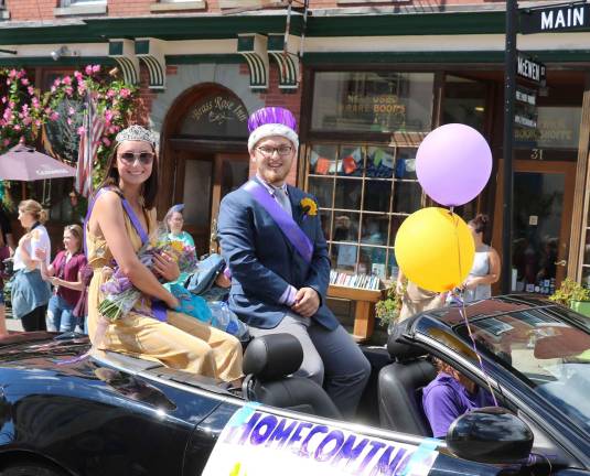 Crowds enjoy Homecoming Day Parade on Main Street Photo by Roger Gavan This year’s King and Queen were Daniel Bilezikian and Madeleine Wadeson.