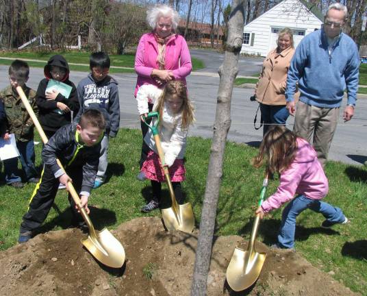 Village of Warwick celebrates Arbor Day at Stanley-Deming Park Several children from each class were invited to take turns shoveling some dirt to help plant the new tree.(Additional photos can be found online at warwickadvertiser.com.)