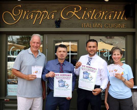 Town Board names August Backpack Snack Attack Back to School Month Photo by Roger Gavan Among Backpack Snack Attack's biggest supporters is the Grappa Ristorante on Railroad Avenue in the Village of Warwick. Picgured are: Backpack Snack Attack volunteers Len Singer (left) and Arlene Neiman deliver fund-raising materials to Grappa partners Nick Ahmetaj and Tony Sylaj.