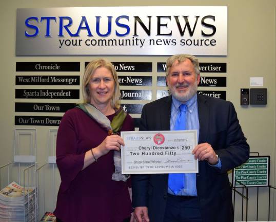 Third shopper wins $250 in Straus News Shop Local Sweepstakes Straus News Director of Sales and Marketing Frank Curcio presented the winning check to Cheryl Dicozstanzo, who won with her receipt from Etched in Time in Warwick.