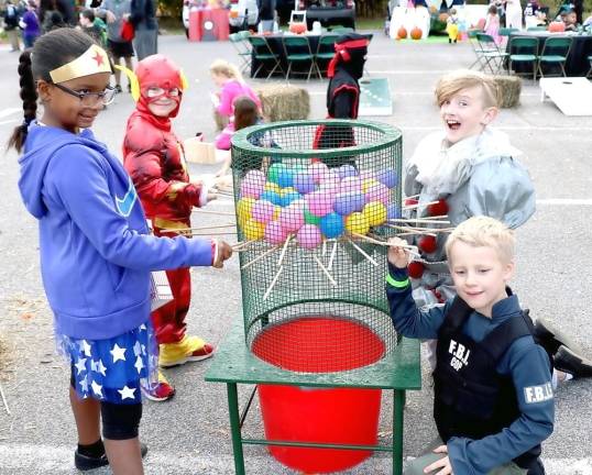 Trunk or Treat event raises $1,500 for St. Stephen – St. Edward Elementary School The object of this game is to remove a stick without dropping a ball.