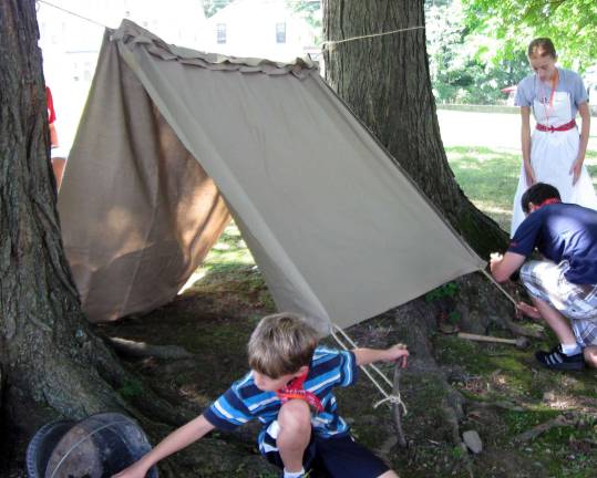 Registration open for local history summer programs During last year's Local History Summer Camp program, children set up a tent and campsite in Lewis Park that was indicative of earlier times. Over the course of the week they were introduced to traditional games, map making, military drills, muskets, early cooking, leatherwork, woodworking and photography.