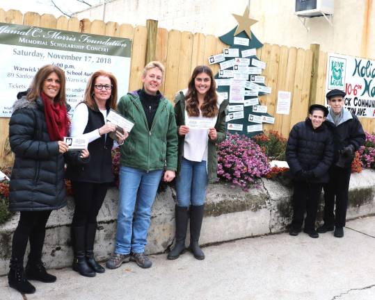 Home for the Holidays helped support the Warwick Ecumenical Council's Food Pantry File photo by Roger Gavan From left, this year's Angel Tree committee members: Kim Corkum Cindy Vanderplaat, Betsy Mitchell, Olivia Quinones and Susan and Glenn Dickes. Eileen Paterson was not available for the photograph.