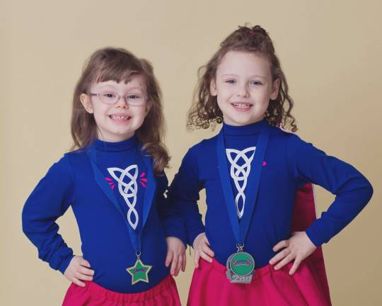 Celebrating St. Patrick's Day James Robine of Milford, Pa. "Madeline Egan and Emma Robine, both of Sunrise Lake, pose after competing at the Irish Dance Competition at Dingman Delaware Middle School hosted by the Kenny Cavanaugh School of Irish Dance this past February."
