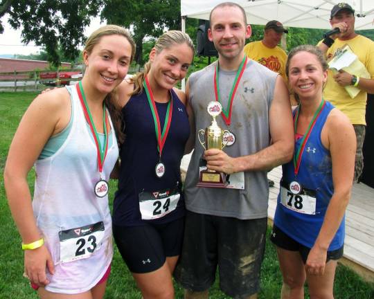 Pennings Farm Market hosts first annual Mad Apple Dash The ìWig-N-Outî team of four won first place: From left, Jennifer Altland, Kayla Lashway, Michael Kramer and Jessica Altland.