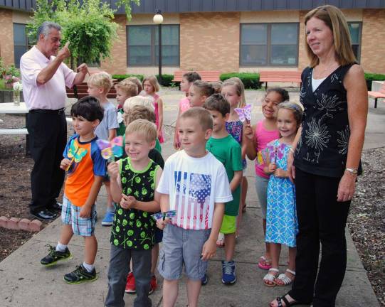 Sanfordville Elementary has a new butterfly garden Principal Roger Longfield speaks to a group of kindergartners in the butterfly garden.