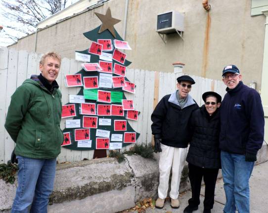 Annual Angel Tree now in place for 2017 Photo by Roger Gavan From left, Angel Tree sponsor Betsy Mitchell. Glenn and Susan Dickes and Town of Warwick Supervisor Michael Sweeton. Track 7 owners Jim and Eileen Patterson were not available for the photo.