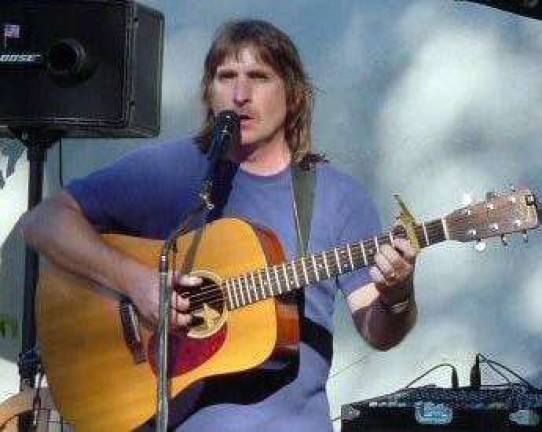 Older, much older than the history of rock n’ roll John Sheehan will demonstrate the roots of finger-style guitar playing on Aug. 24 at the Albert Wisner Public Library in Warwick.
