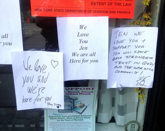 ‘The strong-arm tactics of the Department of Taxation’ Photo by Terry Reilly Notes of support quickly appeared on the windows of La Petite Cuisine, the popular cafÈ at on Railroad Avenue that was closed by the state last week for non-payment of taxes. Owner Jennifer Haesche looks to re-open this weekend.
