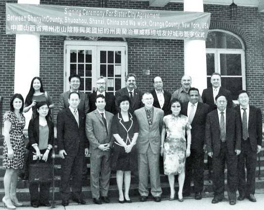 Chinese delegation visits former Mid-Orange prison side Photo by Roger Gavan After posing for photographs with their hosts on the steps of the Warwick Town Hall, the Chinese delegation of government and business representatives from the Shanyin District of Shanxi Municipality joined local officials, representatives of the Orange County Partnership and Business Accelerator and a representative of Assemblyman Peter Rivera assembled inside for an official ceremony.
