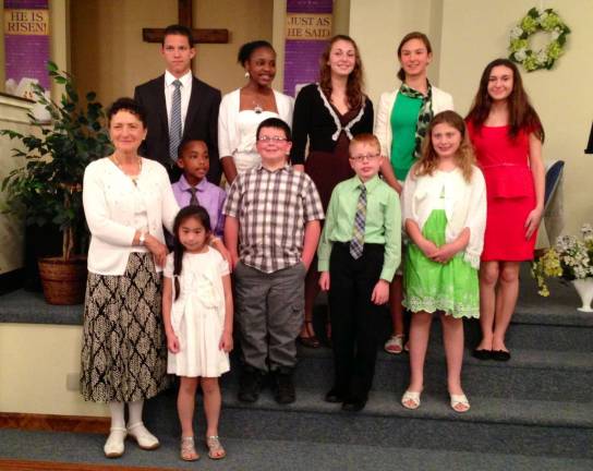 Young pianists host Mini Solo Recital Pictured: Shayne Harrell, Isabelle Marseille, Olivia Coyle, Maya Rakoczy, Paige Koehler, Margaret Korczynski - teacher, Olivier Marseille, Brian McKinnon, Derek Koch, Maria Berlingeri and Sarah Werner.